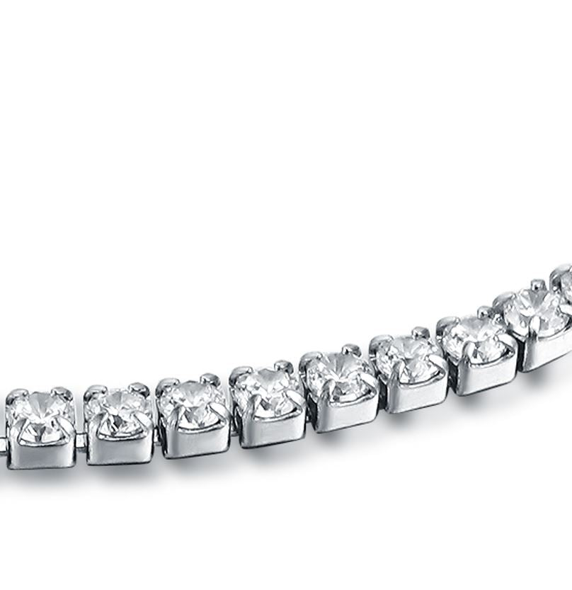 Bracciale tennis cuori pendenti