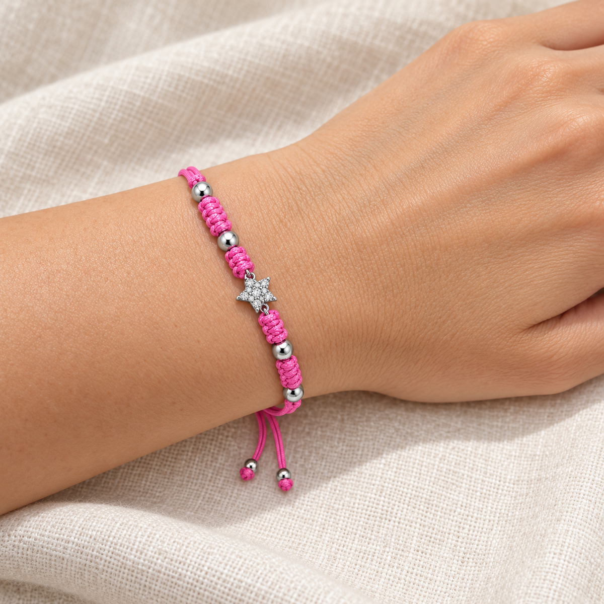 Bracciale con Stella Pavè e Cordino Rosa in Argento 925