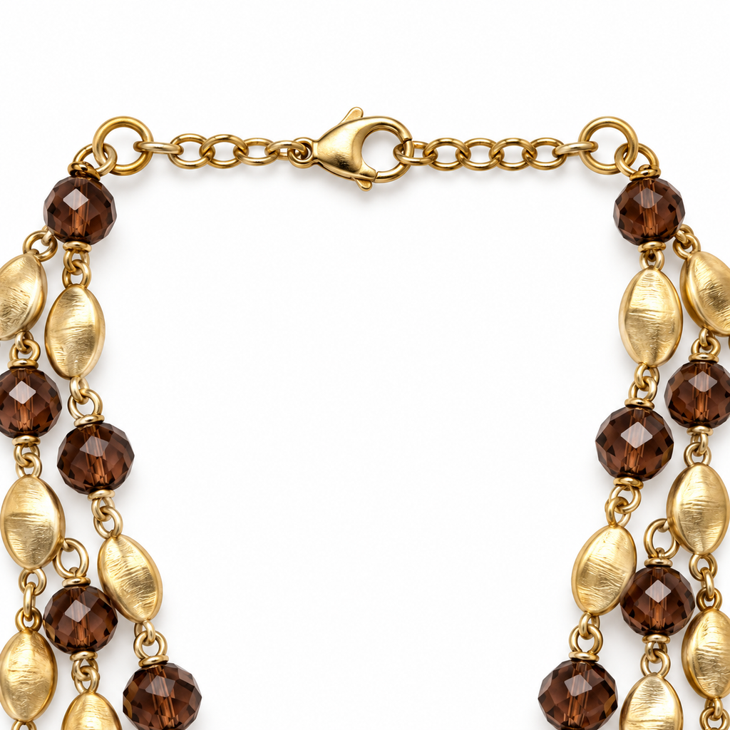 Collana lunga multifilo con cristalli e dettagli sfaccettati