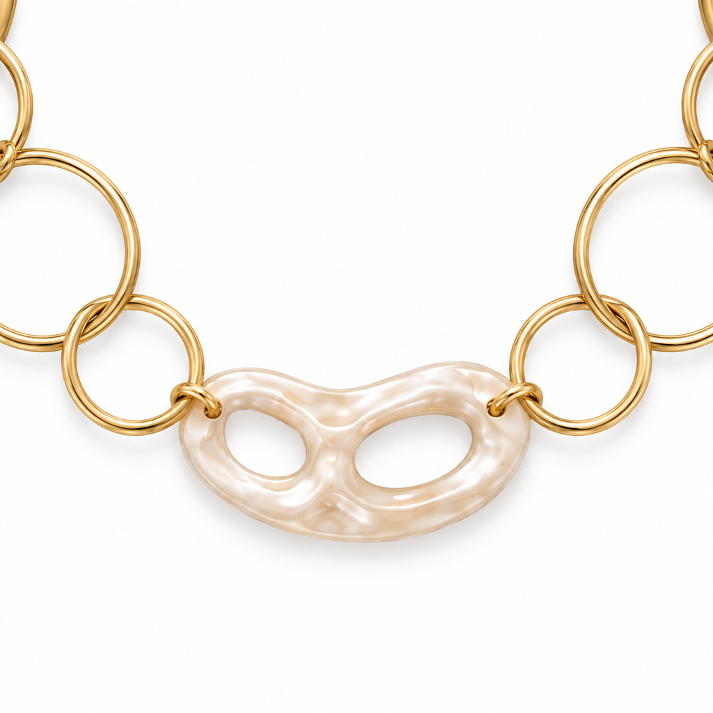 Collana lunga in acciaio inox dorata con anelli e maglie irregolari effetto madreperla