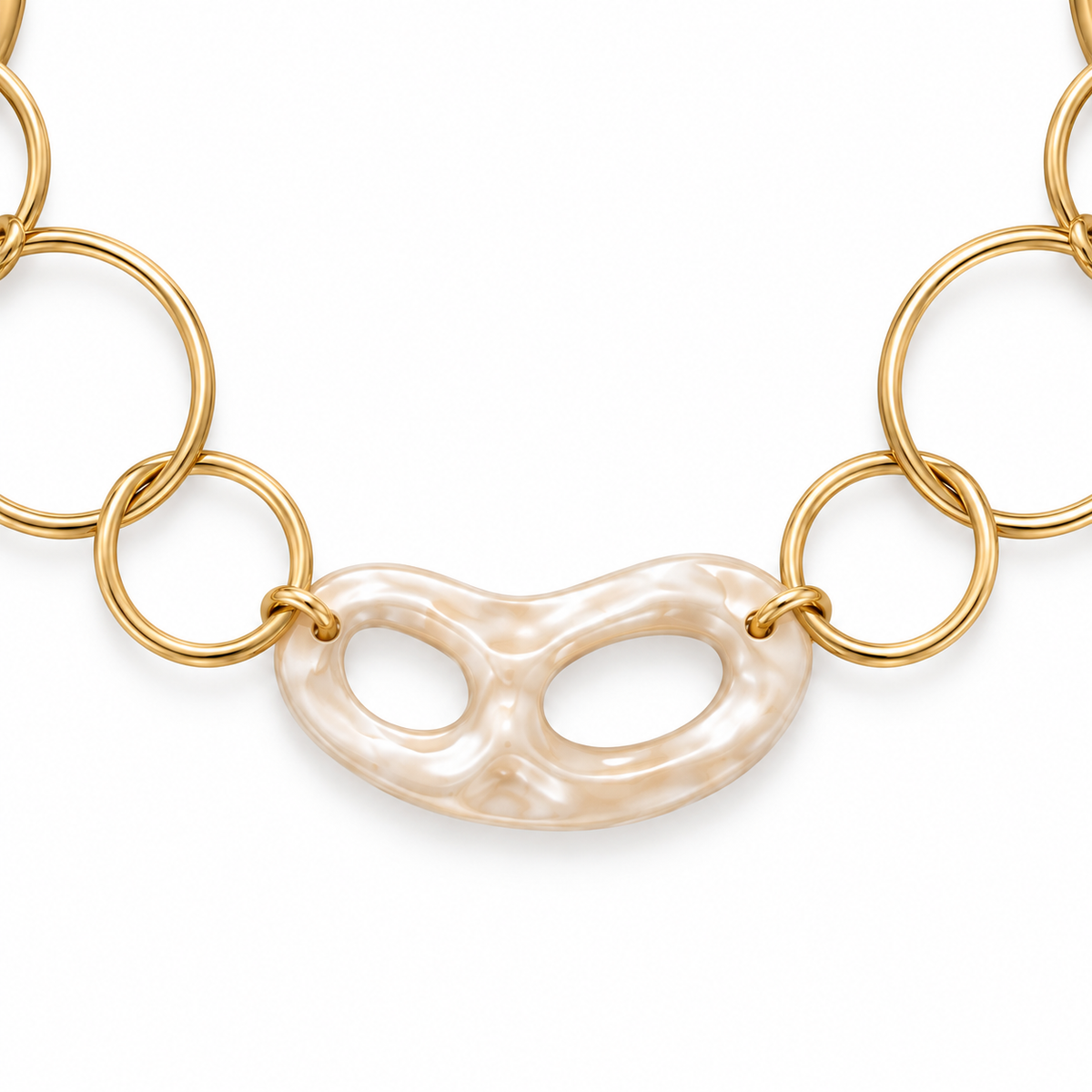 Collana lunga in acciaio inox dorata con anelli e maglie irregolari effetto madreperla