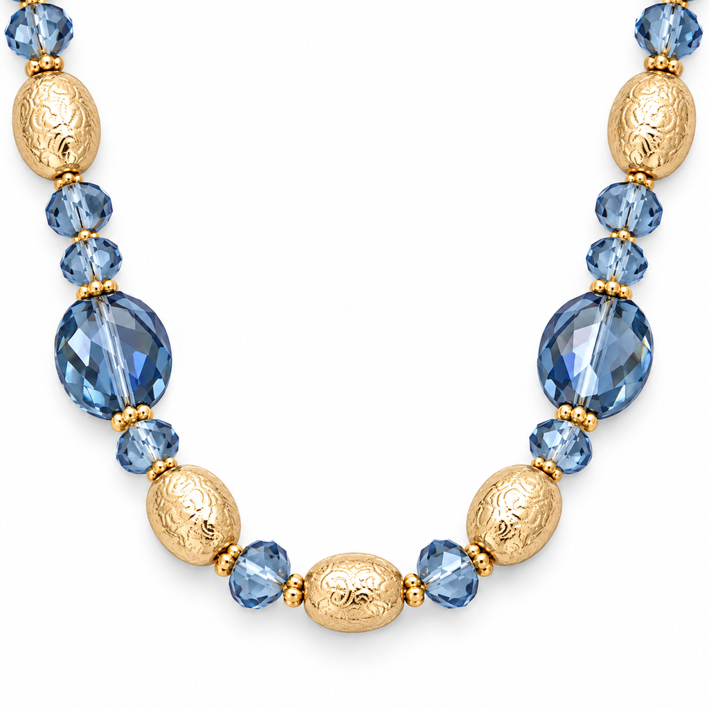 Collana lunga con cristalli e anelli martellati dorati