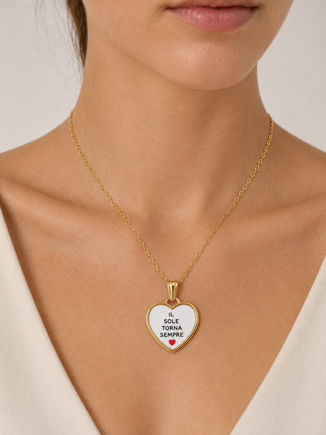 Collana in acciaio inox "Il sole torna sempre"
