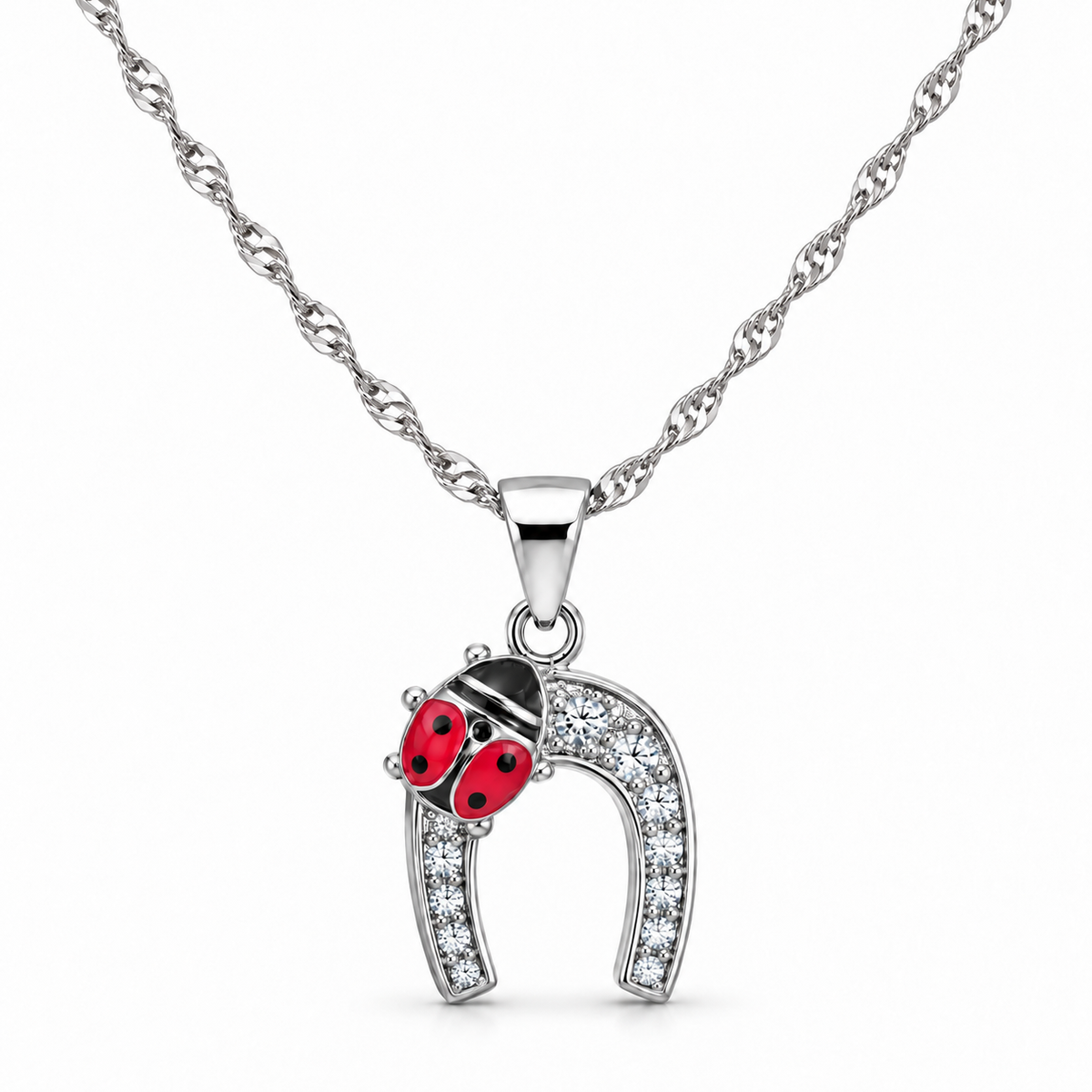 Ketting met hanger in de vorm van een hoefijzer en lieveheersbeestje van 925 zilver