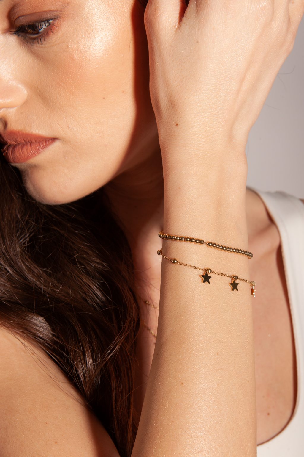 Bracciale pallini con stelline pendenti