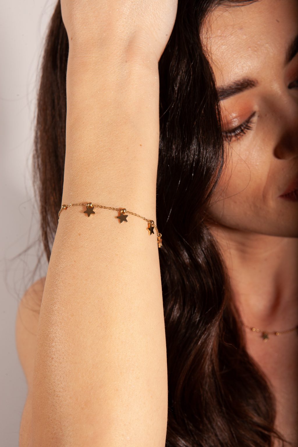Bracciale con stelline pendenti