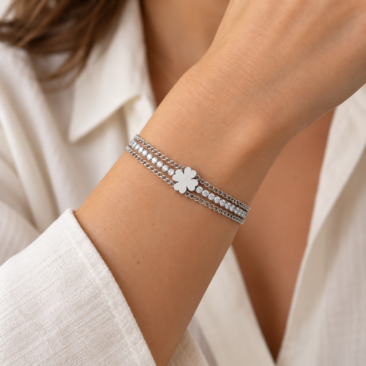 Bracciale Tennis in acciaio inox a tre fili e simbolo Quadrifoglio