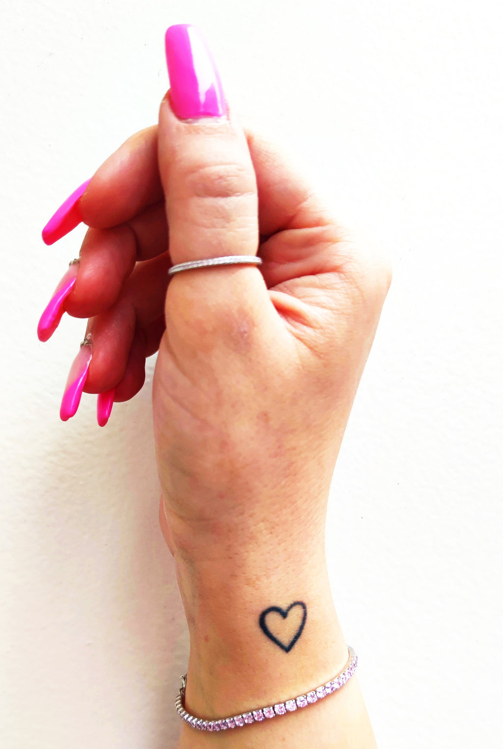 Bracciale tennis rosa in argento 925